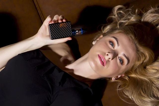 A clear vaping device producing vapour with a clean, minimalist aesthetic representing the naked water trend in Australia